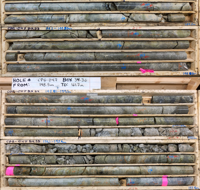 A group of wooden crates with rocksDescription automatically generated with medium confidence